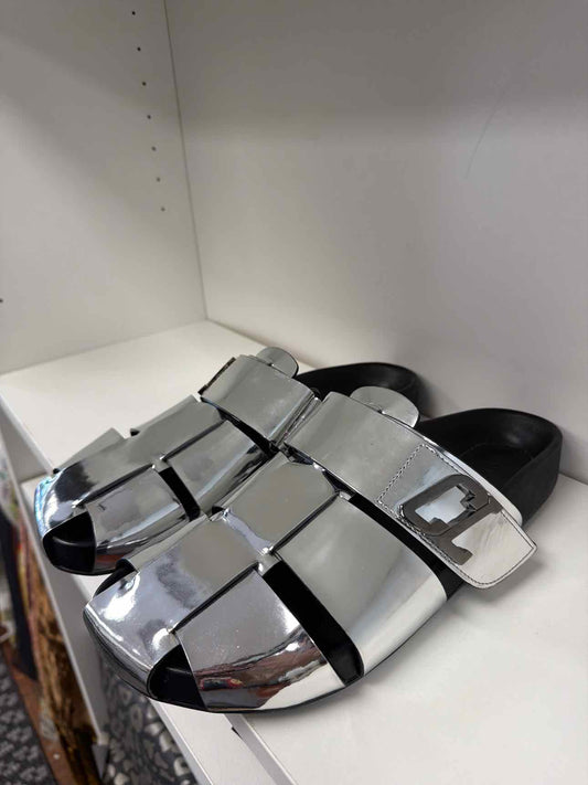 Silver Louboutin slides