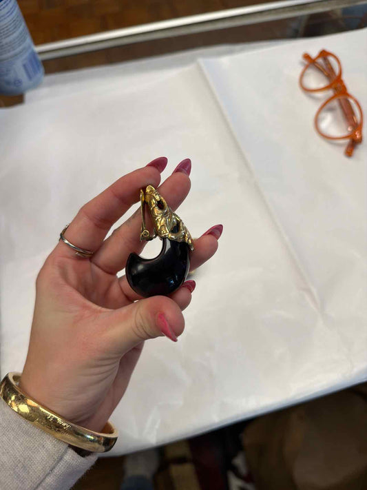Black and gold droplet clip on