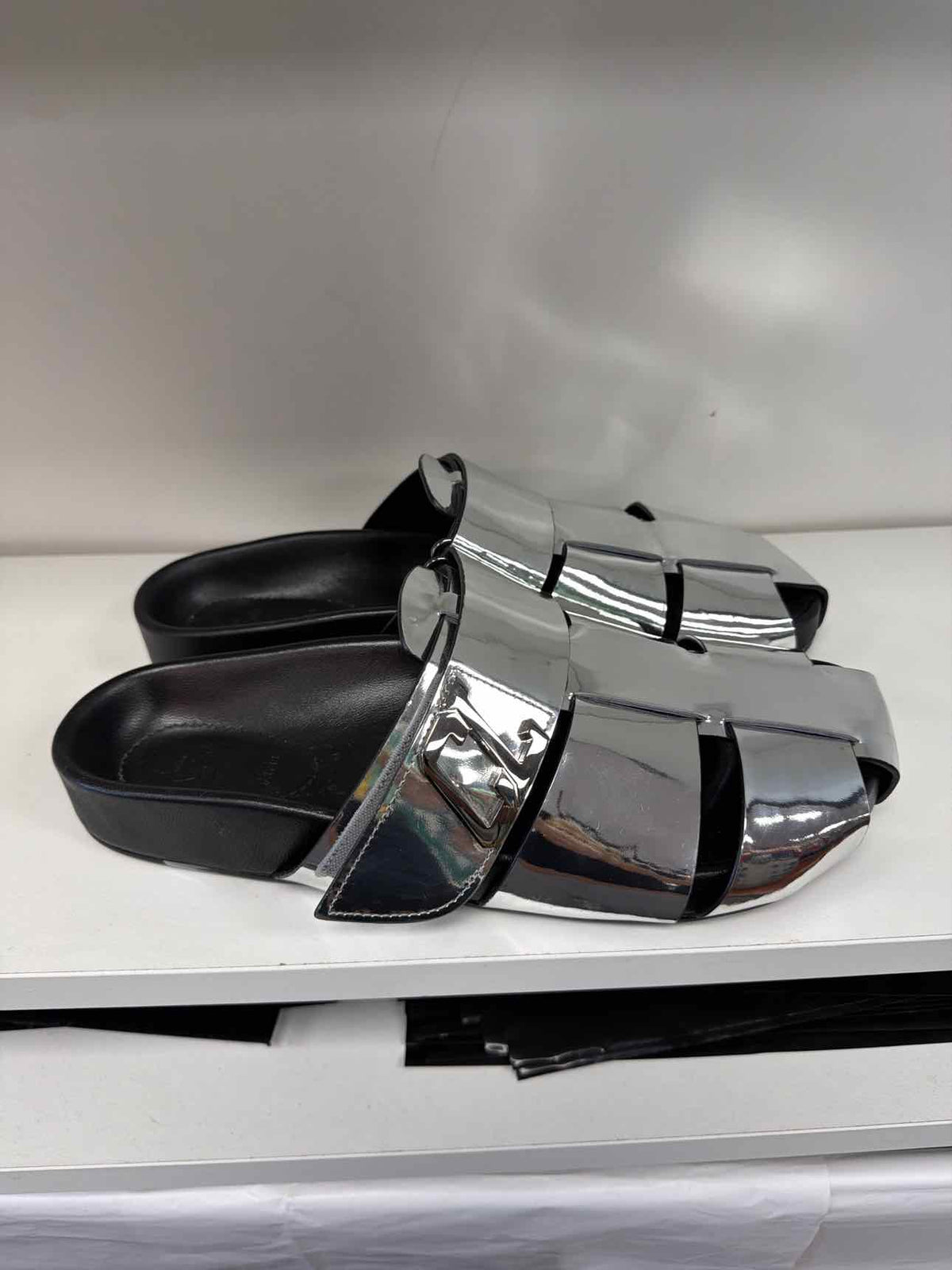 Silver Louboutin slides