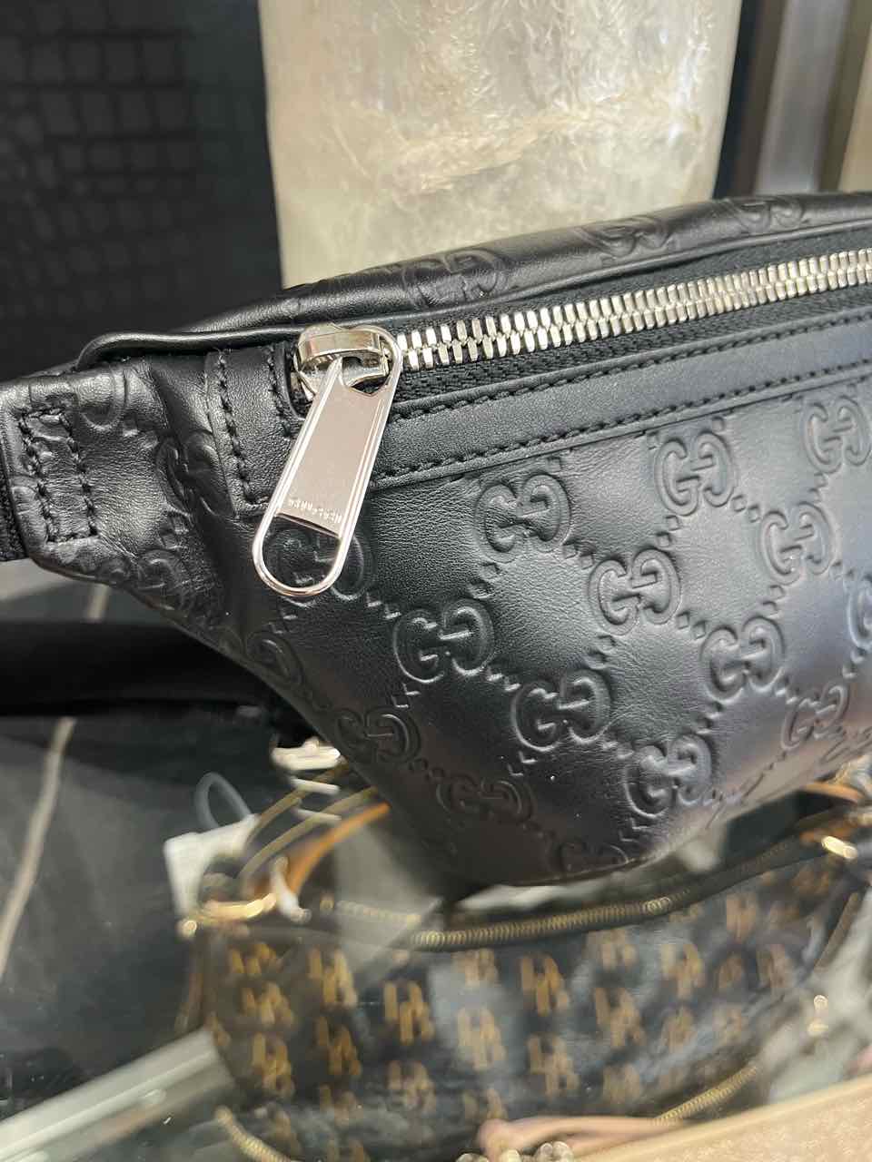 Gucci GG Embossed leather belt bag/tennis bag in black