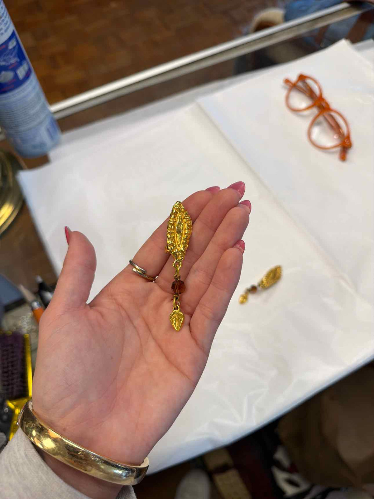 Gold leaf earrings with brown bead clip ons
