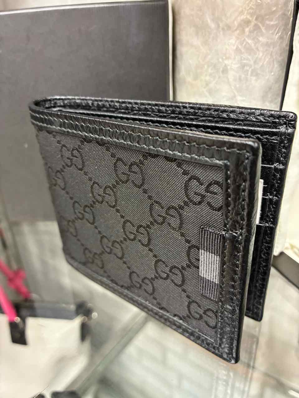 Gucci black canvas and leather monogram wallet