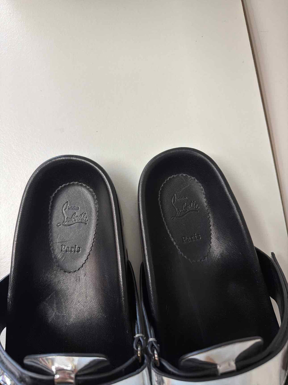 Silver Louboutin slides