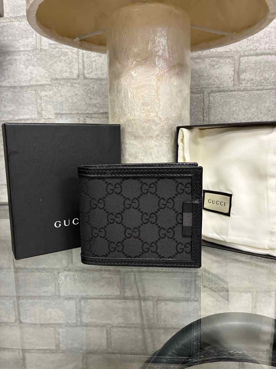 Gucci black canvas and leather monogram wallet