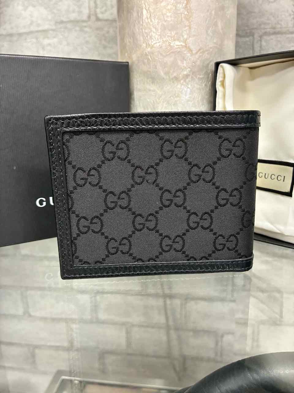 Gucci black canvas and leather monogram wallet