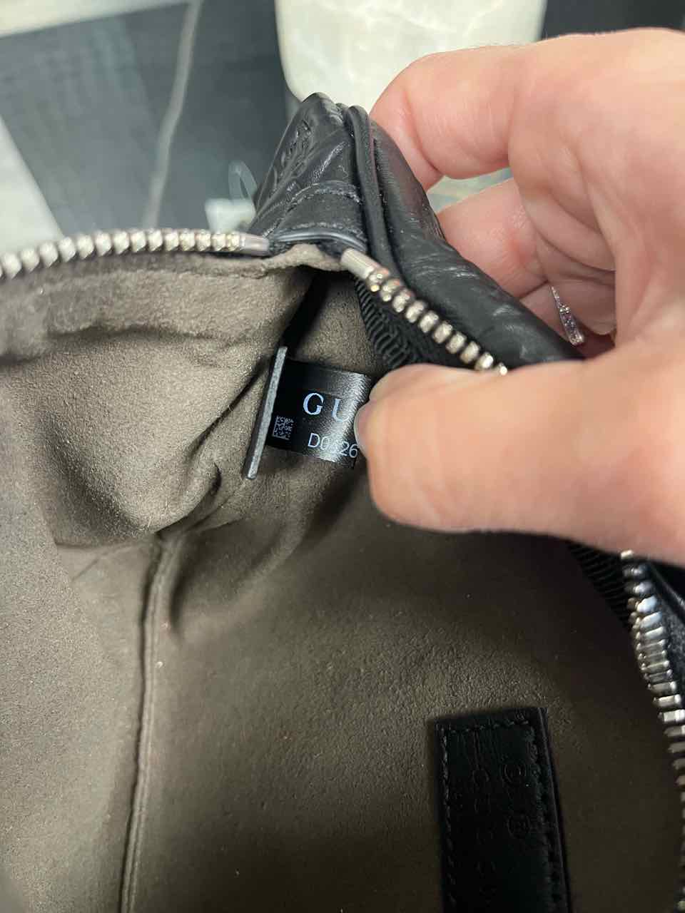 Gucci GG Embossed leather belt bag/tennis bag in black