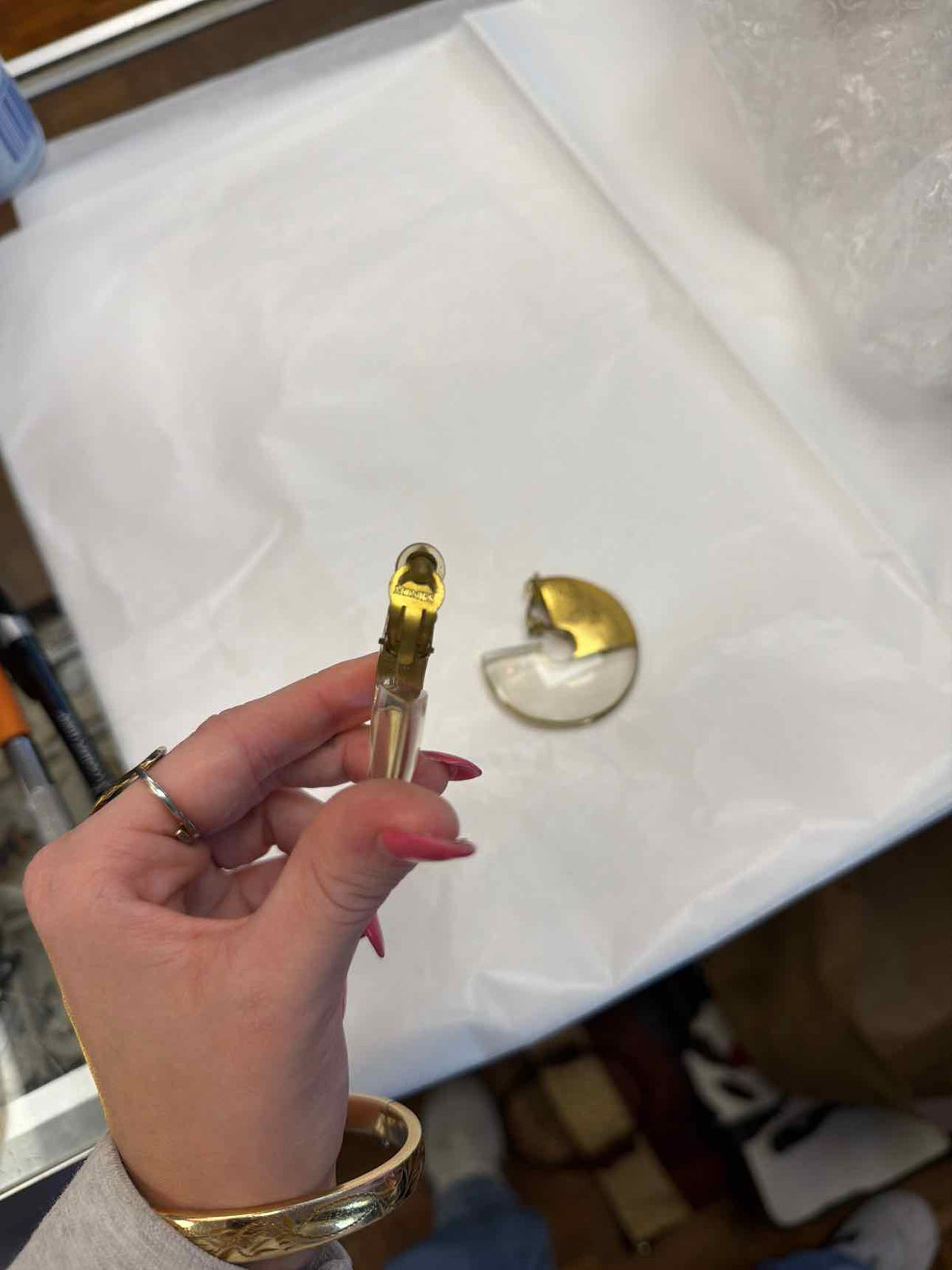 Clear and gold half circle shaped clip ons