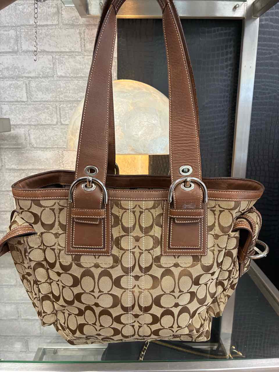 Coach Brown Tote Bag w/ Monogram Fabric and Brwon Leather Buckle Straps Purse