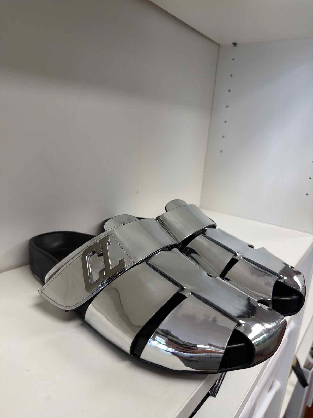 Silver Louboutin slides
