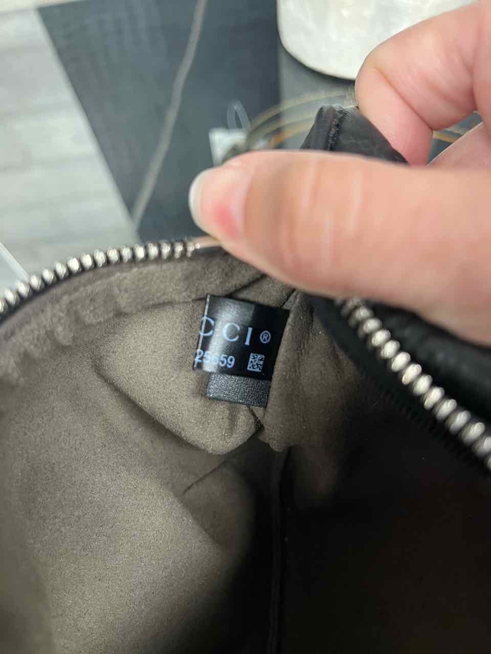 Gucci GG Embossed leather belt bag/tennis bag in black