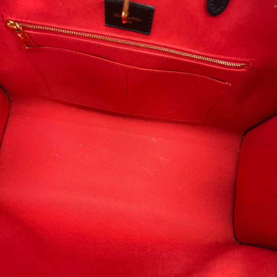 Louis Vuitton On The Go MM Bag