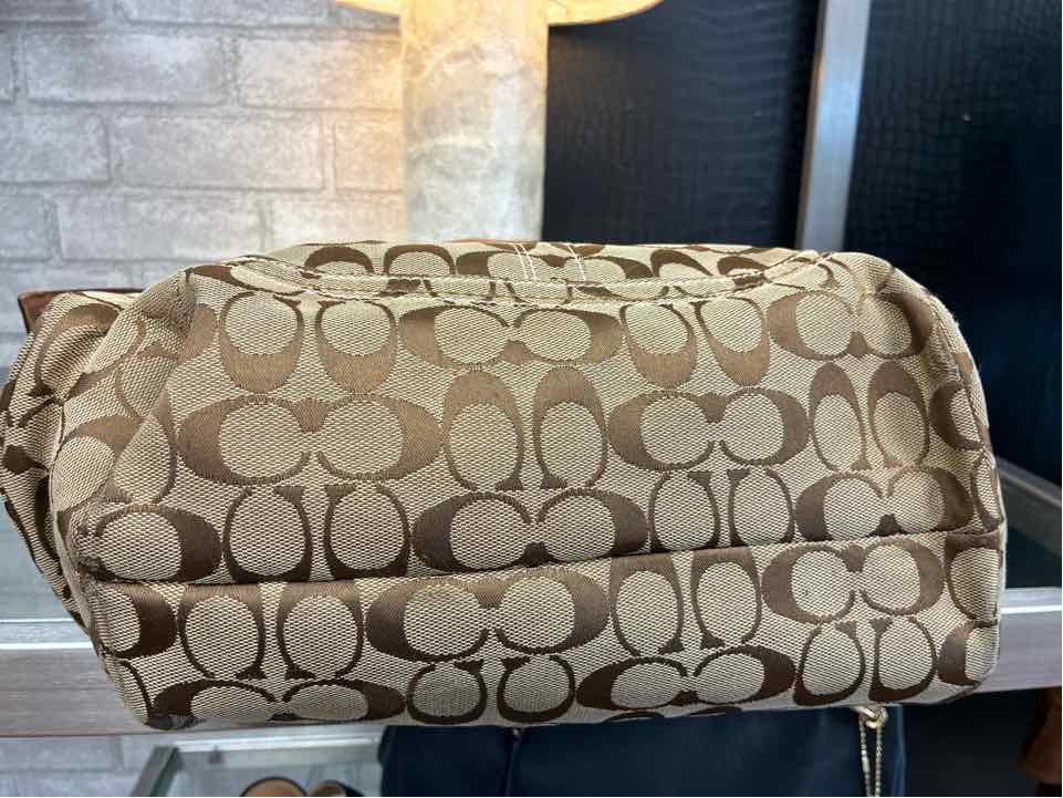 Coach Brown Tote Bag w/ Monogram Fabric and Brwon Leather Buckle Straps Purse